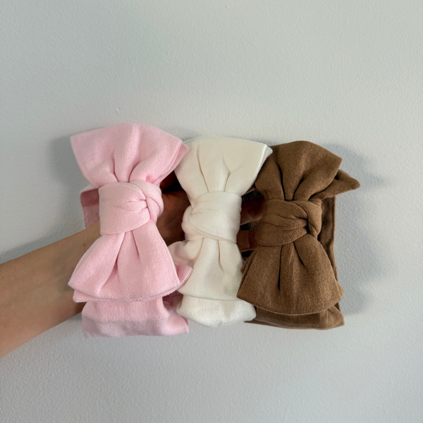 Soft Topknot baby headband in white, baby pink and brown