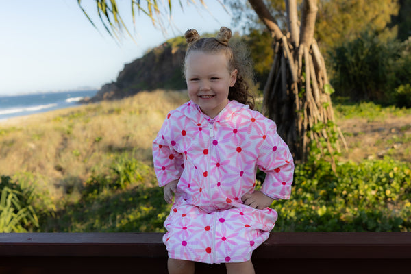 mae and rae pink floral hooded towel at sunny gold coast beach 