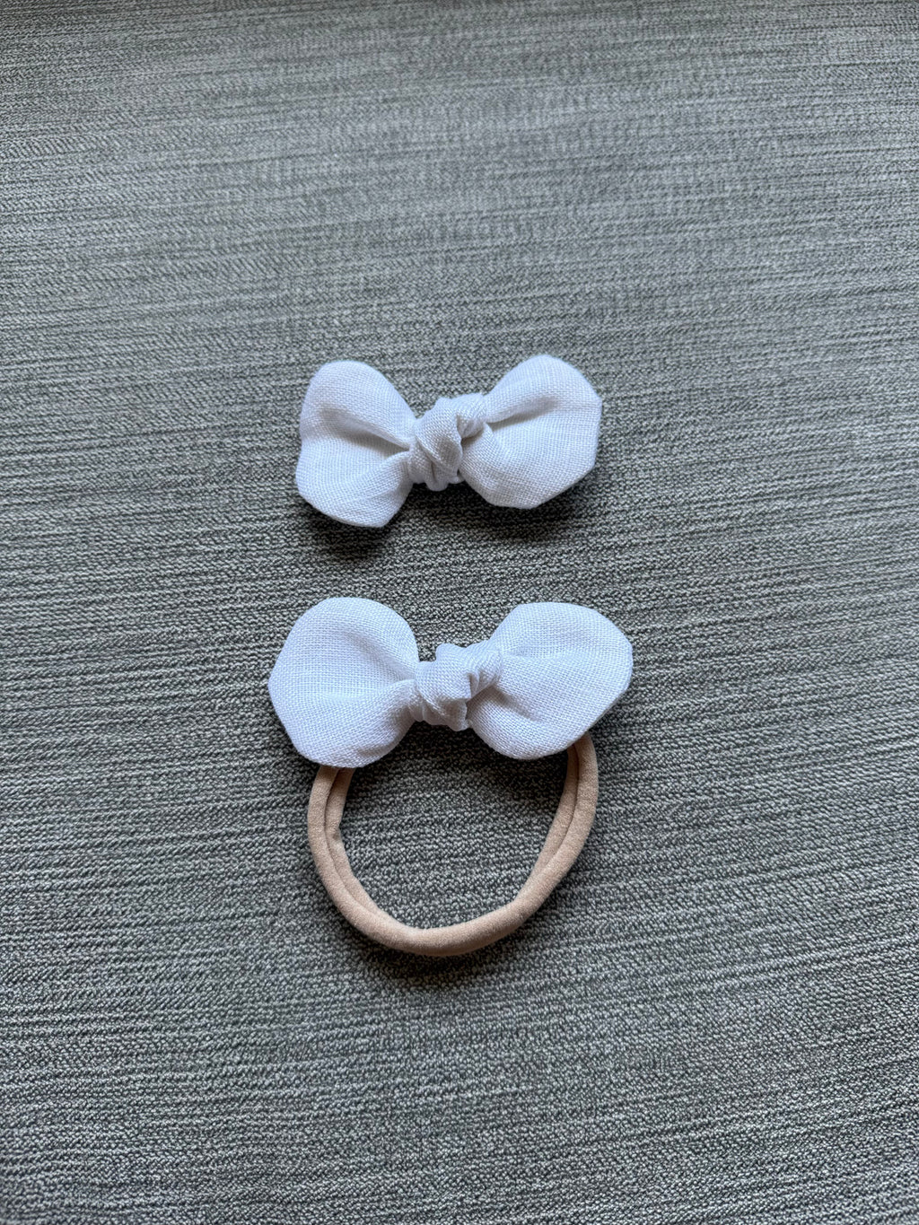 baby bow headband snow white flatlay