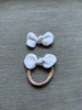 baby bow headband snow white flatlay